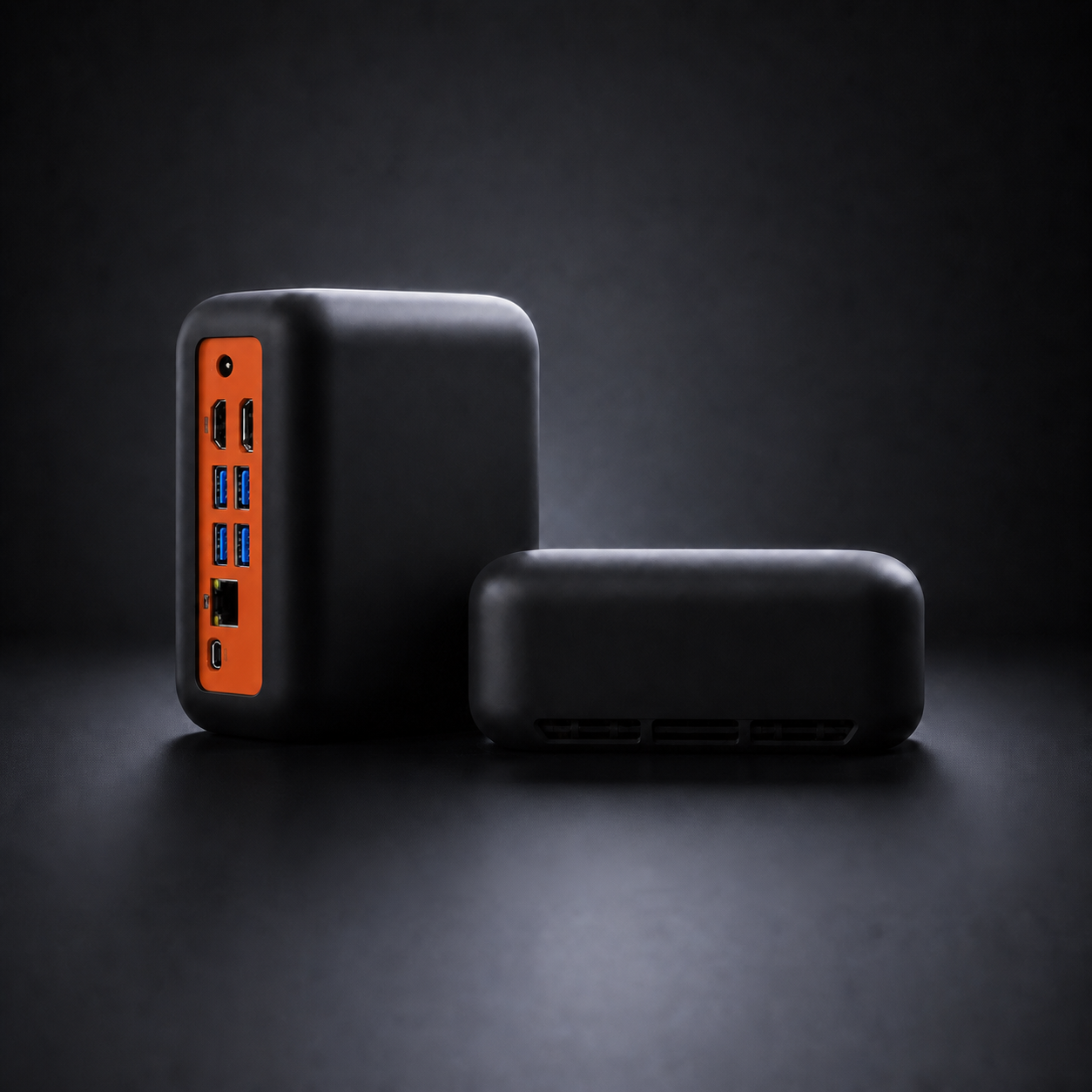 Two views of the compact black Memo Base Station